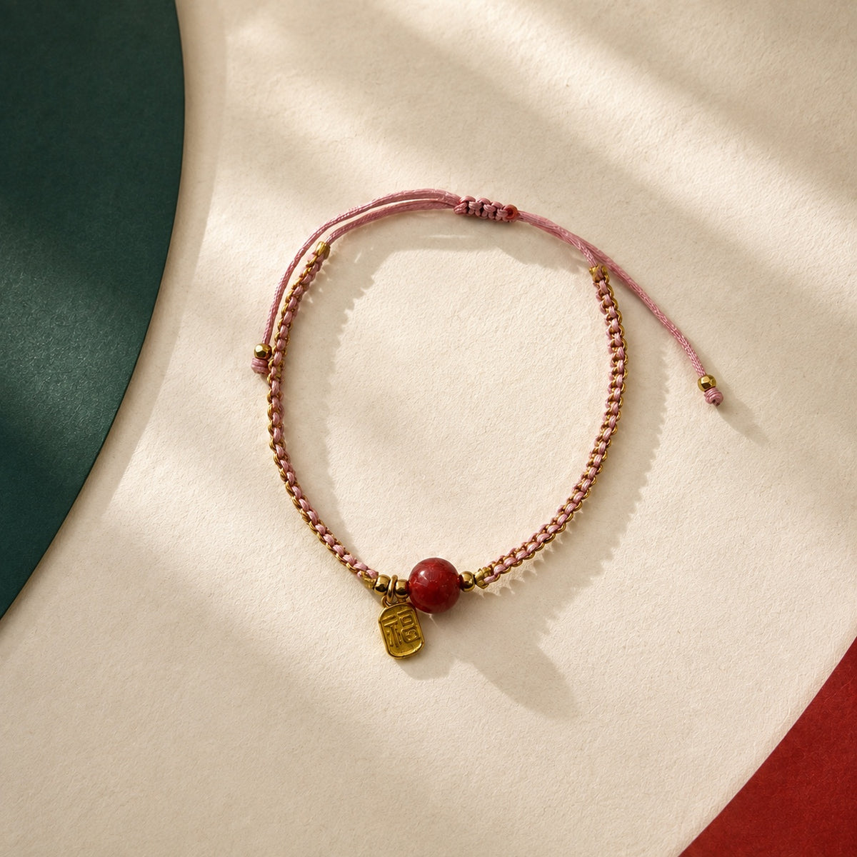 A Thread of Joy · Braided Glass Bracelet · Pink glass charm
